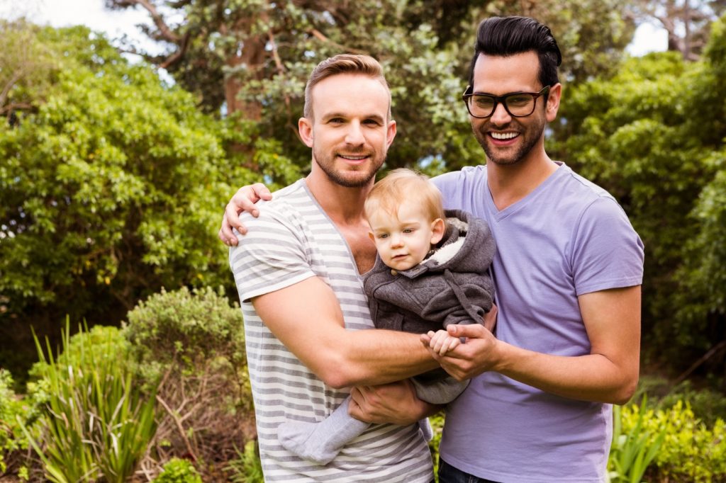 gay couple with surrogate baby