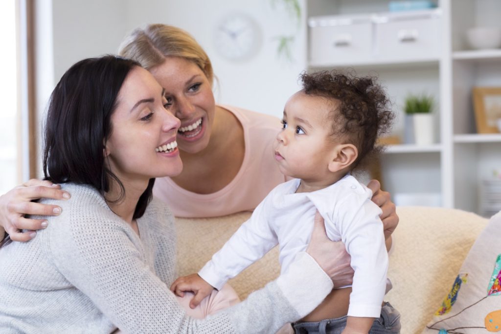 newborn with surrogate parents