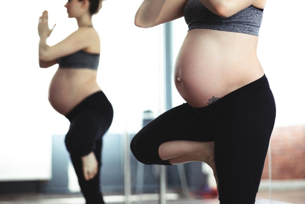 pregnant woman in yoga pose